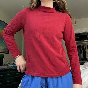 Red mock neck long sleeve top